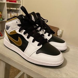 Size 4Y Air Jordan 1 Mids. Brand new, still in box